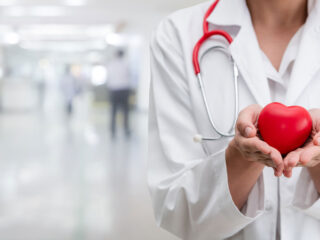 Doctor handling heart